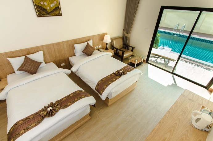 Imagen de la habitación del Hotel Airport Beach Hotel Phuket. Foto 5