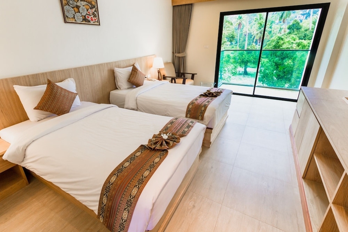 Imagen de la habitación del Hotel Airport Beach Hotel Phuket. Foto 6