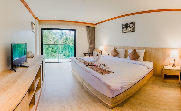 Imagen de la habitación del Hotel Airport Beach Hotel Phuket. Foto 8