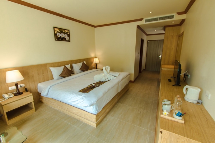 Imagen de la habitación del Hotel Airport Beach Hotel Phuket. Foto 9