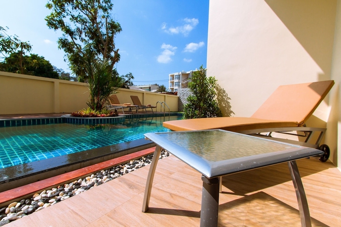 Imagen de la habitación del Hotel Airport Beach Hotel Phuket. Foto 10