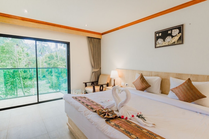 Imagen de la habitación del Hotel Airport Beach Hotel Phuket. Foto 11