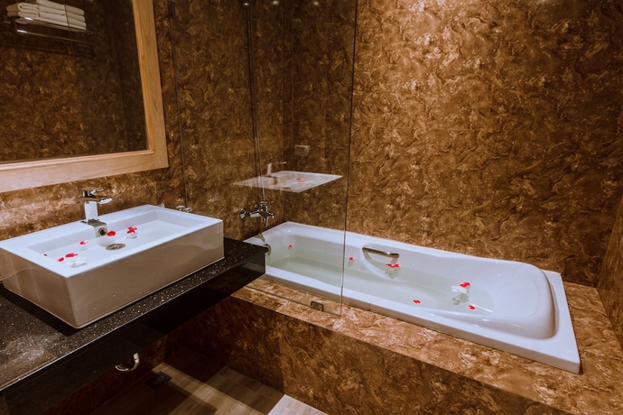 Imagen de la habitación del Hotel Airport Beach Hotel Phuket. Foto 12