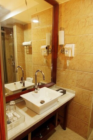 Imagen de la habitación del Hotel Airport Golden Tulip.. Foto 20