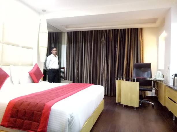 Imagen de la habitación del Hotel Airport Grand Delhi. Foto 6