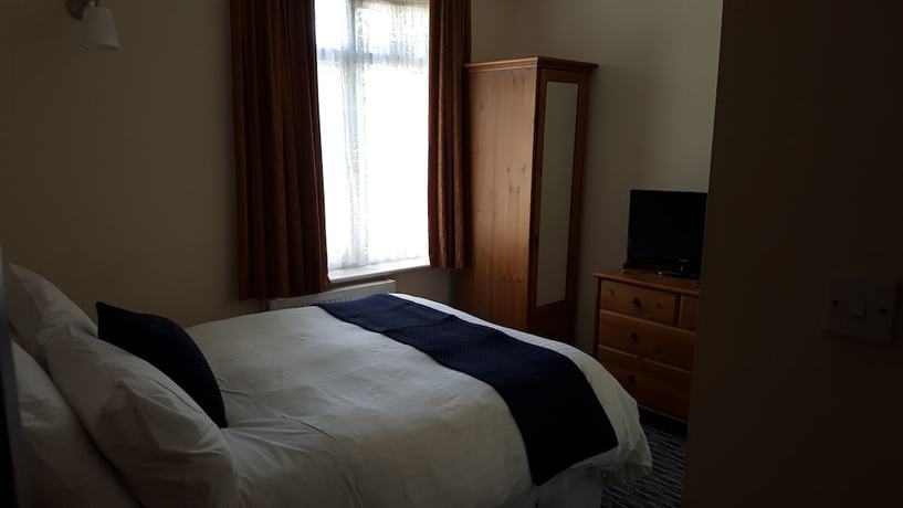 Imagen de la habitación del Hotel Airport Guest House, Colnbrook. Foto 6