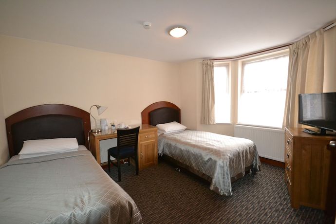 Imagen de la habitación del Hotel Airport Guest House, Colnbrook. Foto 12