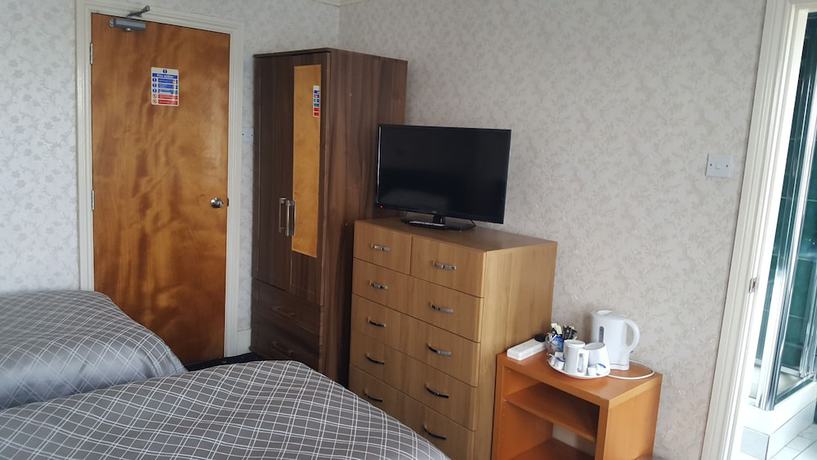 Imagen de la habitación del Hotel Airport Guest House, Colnbrook. Foto 14