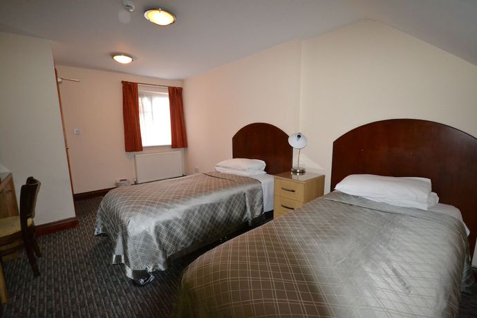 Imagen de la habitación del Hotel Airport Guest House, Colnbrook. Foto 16