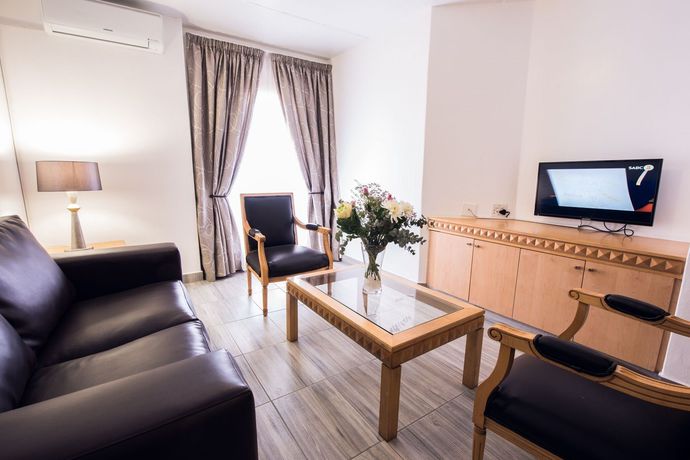 Imagen de la habitación del Hotel Airport Inn and Suites. Foto 3