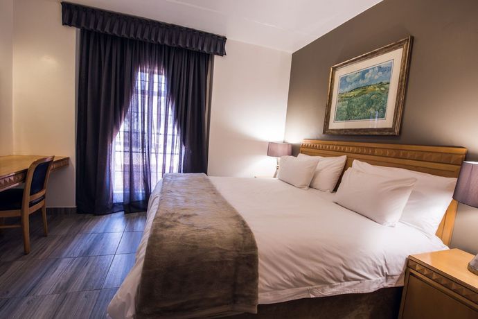 Imagen de la habitación del Hotel Airport Inn and Suites. Foto 7