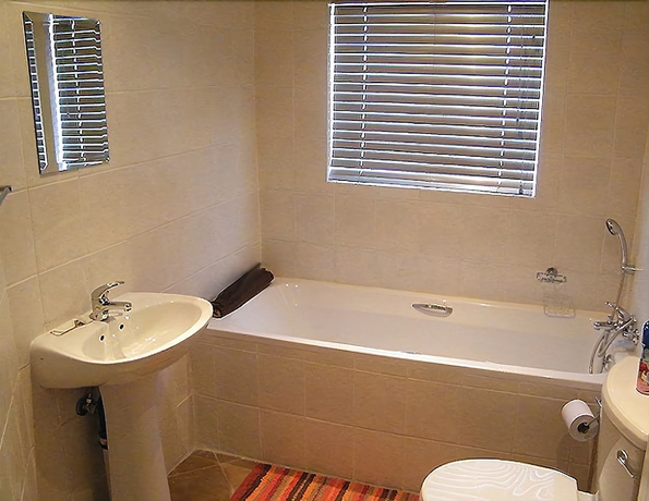 Imagen de la habitación del Hotel Airport Lodge Guest House. Foto 15