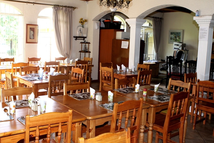 Imagen del bar/restaurante del Hotel Airport Lodge Guest House. Foto 3