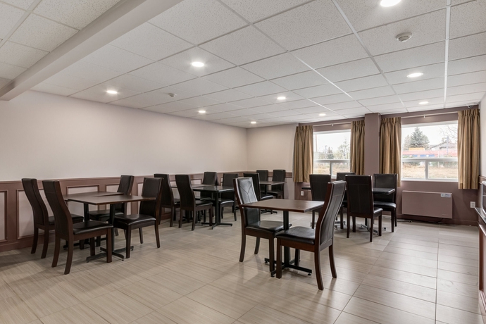 Imagen del bar/restaurante del Hotel Airport Traveller's Inn. Foto 6