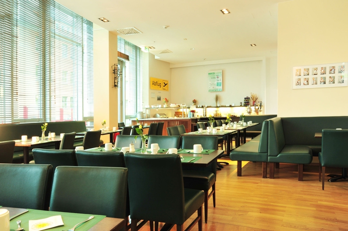 Imagen del bar/restaurante del Hotel Airport berlin adlershof. Foto 2