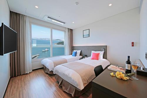 Imagen de la habitación del Hotel Airsky Incheon. Foto 11