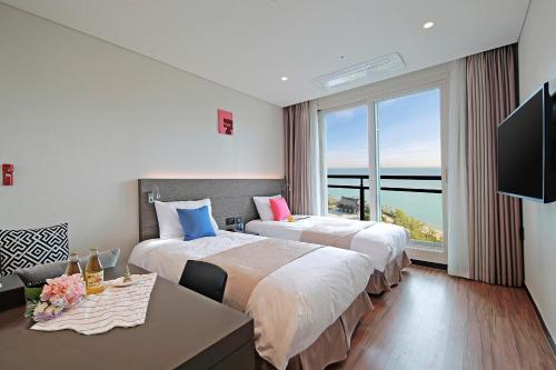 Imagen de la habitación del Hotel Airsky Incheon. Foto 12