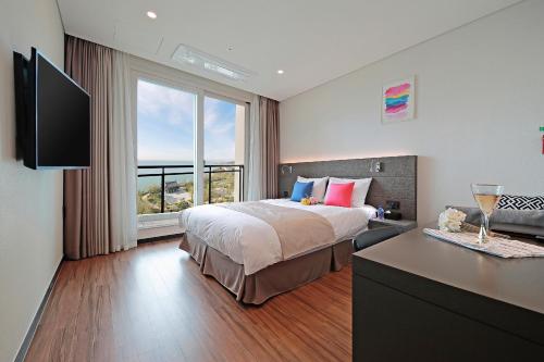 Imagen de la habitación del Hotel Airsky Incheon. Foto 16