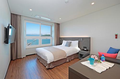 Imagen de la habitación del Hotel Airsky Incheon. Foto 17