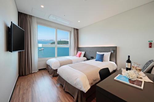 Imagen de la habitación del Hotel Airsky Incheon. Foto 18