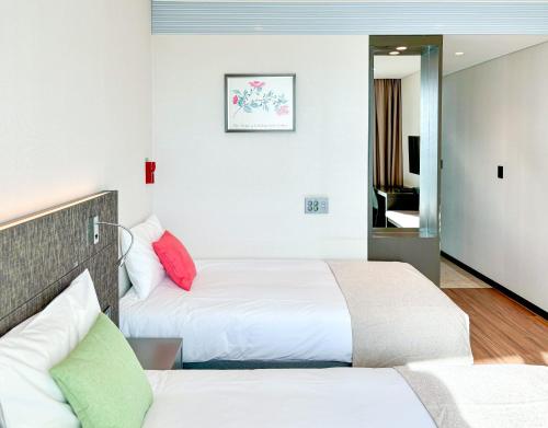 Imagen de la habitación del Hotel Airsky Incheon. Foto 20
