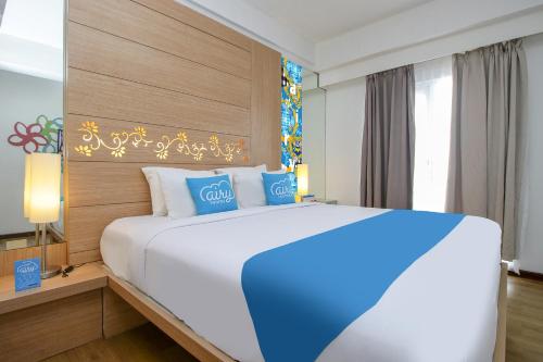 Imagen de la habitación del Hotel Airy Premier Seminyak Cendrawasih 28 Kuta Bali. Foto 5