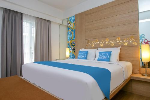 Imagen de la habitación del Hotel Airy Premier Seminyak Cendrawasih 28 Kuta Bali. Foto 7