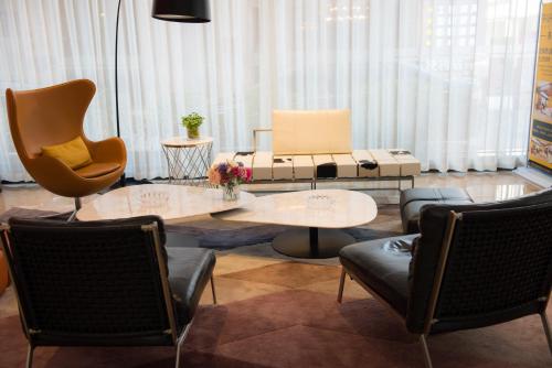 Imagen de la habitación del Hotel Aishang International Furniture City Store. Foto 7