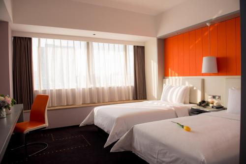 Imagen de la habitación del Hotel Aishang International Furniture City Store. Foto 8