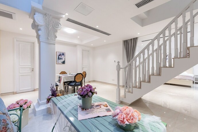 Imagen de la habitación del Hotel Aishangjia. Foto 25