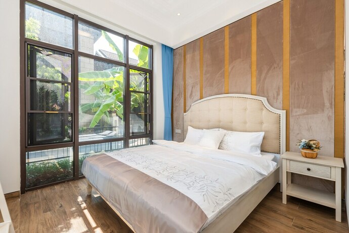 Imagen de la habitación del Hotel Aishangjia. Foto 26