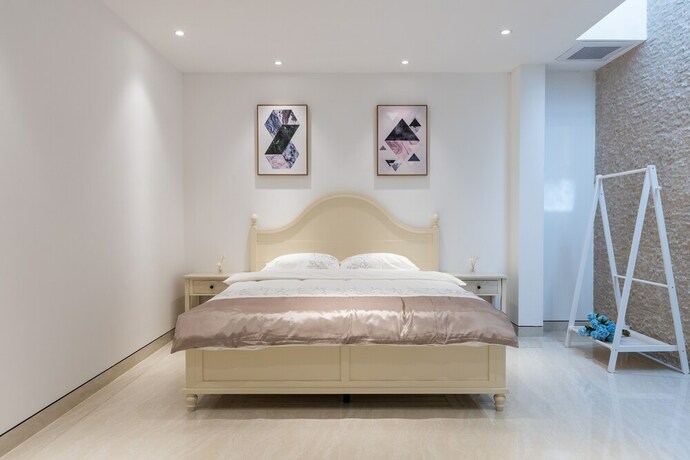 Imagen de la habitación del Hotel Aishangjia. Foto 29