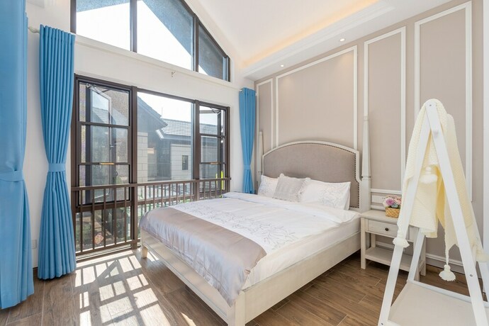 Imagen de la habitación del Hotel Aishangjia. Foto 31