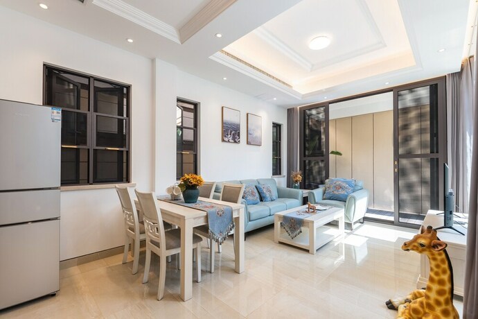 Imagen de la habitación del Hotel Aishangjia. Foto 32
