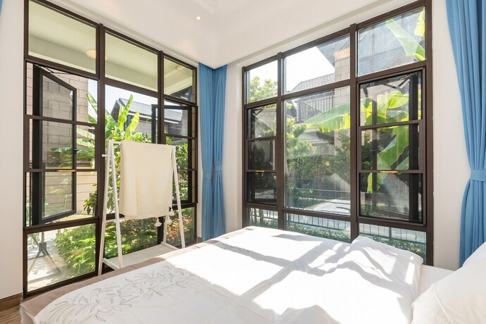Imagen de la habitación del Hotel Aishangjia. Foto 34