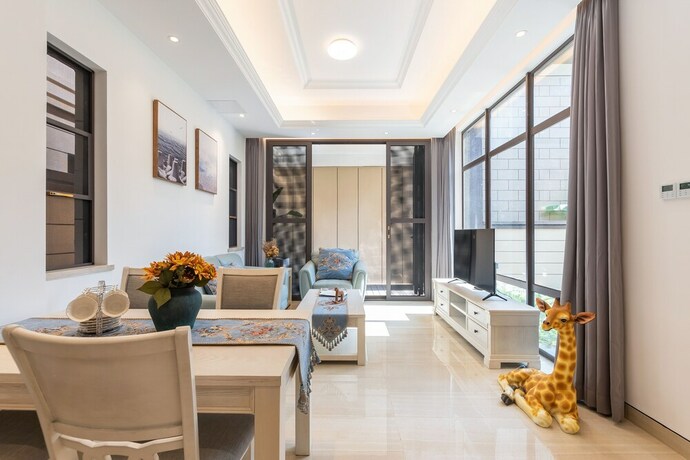 Imagen de la habitación del Hotel Aishangjia. Foto 39