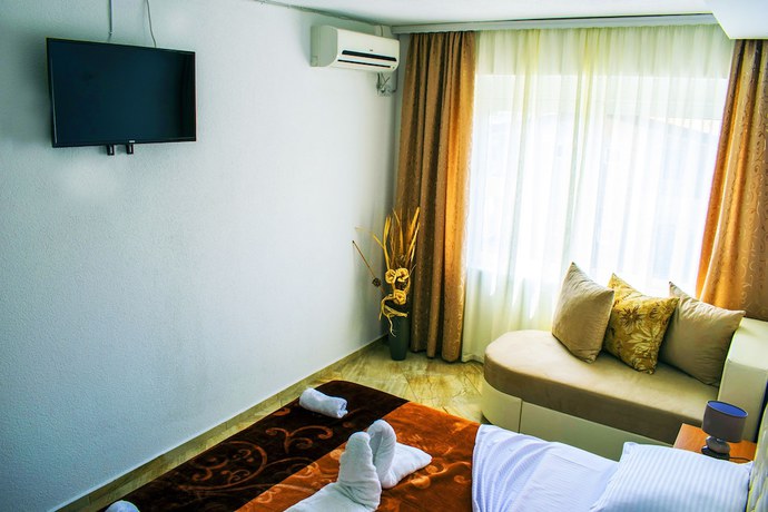 Imagen de la habitación del Hotel Ajana. Foto 19