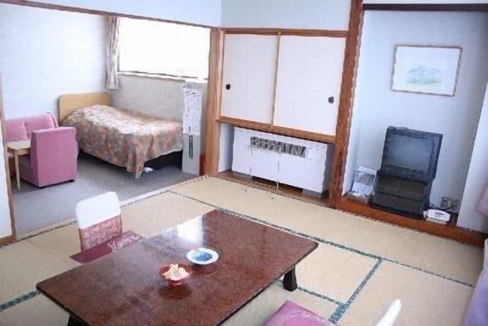 Imagen de la habitación del Hotel Akakura Wakui. Foto 13