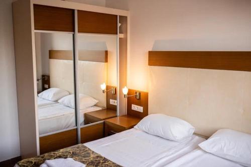 Imagen de la habitación del Hotel Akalia Suite Hotel & SPA. Foto 20