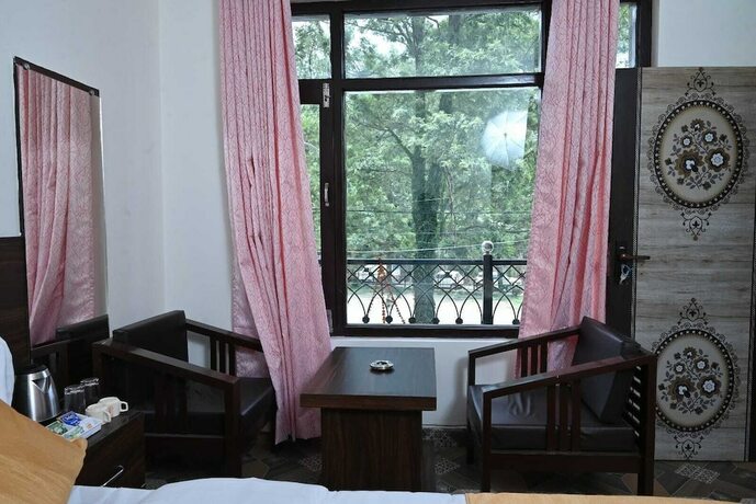 Imagen de la habitación del Hotel Akansha The Lake View. Foto 7