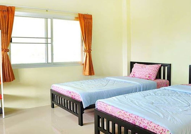 Imagen de la habitación del Hotel Akantuka Homestay. Foto 7