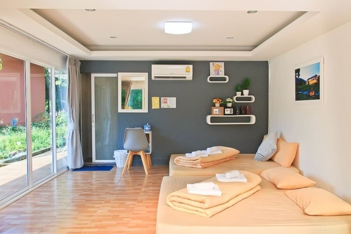 Imagen de la habitación del Hotel Akantuka Homestay. Foto 10