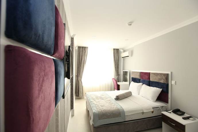 Imagen de la habitación del Hotel Akar. Foto 11