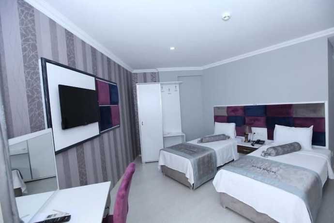 Imagen de la habitación del Hotel Akar. Foto 15