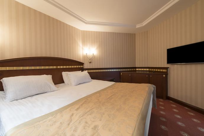 Imagen de la habitación del Hotel Akar International. Foto 2