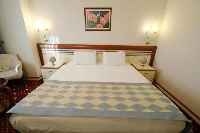 Imagen de la habitación del Hotel Akar International. Foto 3