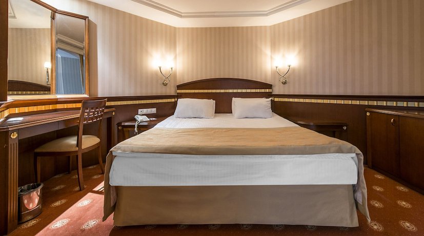 Imagen de la habitación del Hotel Akar International. Foto 4