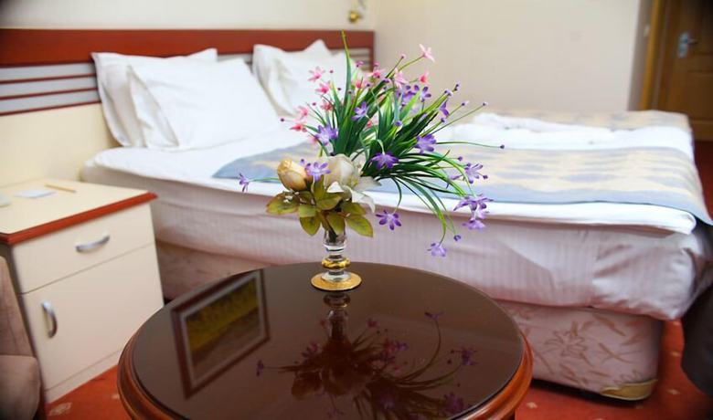 Imagen de la habitación del Hotel Akar International. Foto 5
