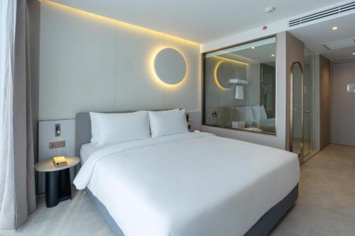 Imagen de la habitación del Hotel Akara Hotel Pattaya. Foto 15