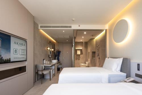 Imagen de la habitación del Hotel Akara Hotel Pattaya. Foto 16